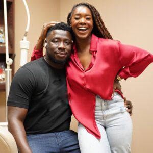 Marie and her husband smiling post orthodontic treatment by Smile Doctors